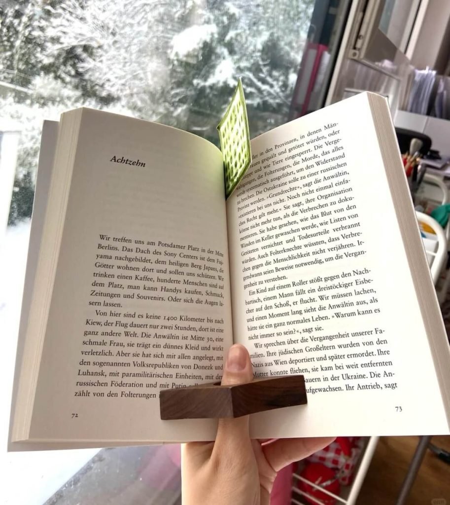 reading book with a book page holder